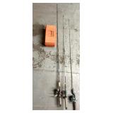 Three fishing poles and tackle box