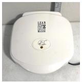Lean mean fat grilling machine