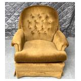 Retro swivel rocking chair has some wear