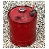 Vintage painted red oil can