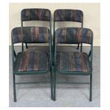 Four cushioned folding chairs