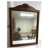 wood wall mirror features a classic arched top