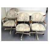 Kitchen table w/4 matching cushion, rolling chairs