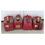 4 plastic, gas jugs, medium size