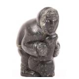 INUIT CARVED STONE HUNTER WITH SEAL - IVUJIVIK