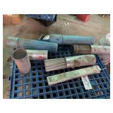 Four Electrode Containers; 2 are full.