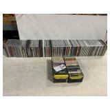 Assorted Cassettes And CD's