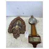 Wall Clock and Religious Painting