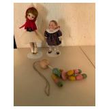 Two Dolls with Wooden Bead Figurine