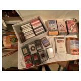 Unopened VHS Tapes and Assorted Cassette Tapes