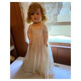 Porcelain Doll in White Lace Dress