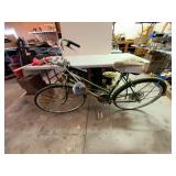 Green Vintage Bicycle with Accessories