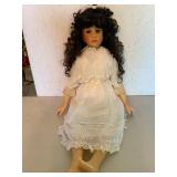 Porcelain Doll with White Lace Dress