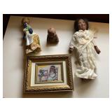 Dolls, Artwork, and a Ceramic Figurine