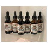 Six Herbal Tinctures in Bottles