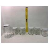 Six Clear Glass Jars With Lids