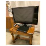 Samsung 30-Inch TV, Sony DVD Player, and Wooden Ta