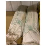 Four Quikrete Tubes and Bags