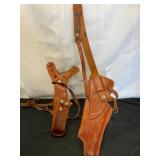 Two Leather Gun Holsters with Straps