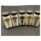 5 Griffiths Milk Glass Spice Jars