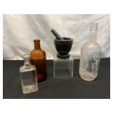 Bottles and Marble Mortar & Pestle