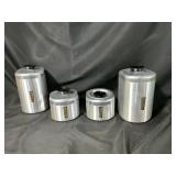 Four Brushed Aluminum Canisters