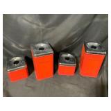 Four Red Metal Kitchen Canisters