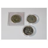 (3) Benjamin Franklin half dollars, 1957, 1958,