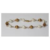 14kt Yellow Gold Fancy Link Bracelet that has