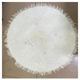 Round Handwoven Ivory Rug
