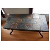 Metal framed table with removable tiles