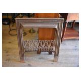 Antique decorative cast iron fireplace surround