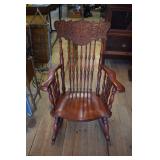 Antique wood carved north winds face rocker