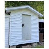 White siding shed