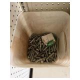 Buckets of assorted bolts