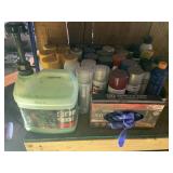 Assorted paint supplies, handi cleaners and gloves