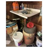 Everything on sink and below over to the tool box