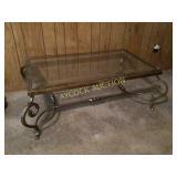 Glass and metal coffee table (gold in color)
