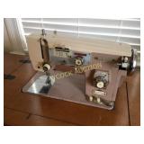 'Good Housekeeping' sewing machine in cabinet