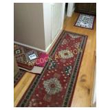 Stack of area & throw rugs