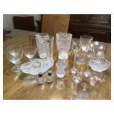 Box with glasses, glass candle holders, etc.