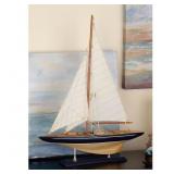 BEIGE WOOD SAIL BOAT SCULPTURE WITH NAVY ACCENTS A