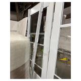 79 X 35 WHITE ALUMINUM STORM DOOR WITH RETRACTABLE