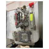 EDELBROCK 4 BARRELL CARBURERATOR AND LINES