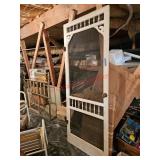 Vintage screen door - under house