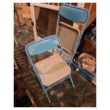 Two metal kids folding chairs- under house