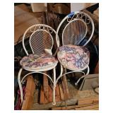 Two patio chairs- under house