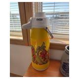 Large vintage carafe   (behind kitchen bar)