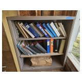 Metal shelf, no contents- under house