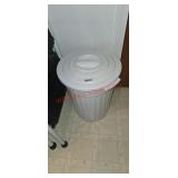 Small white trash can (laundry room)
